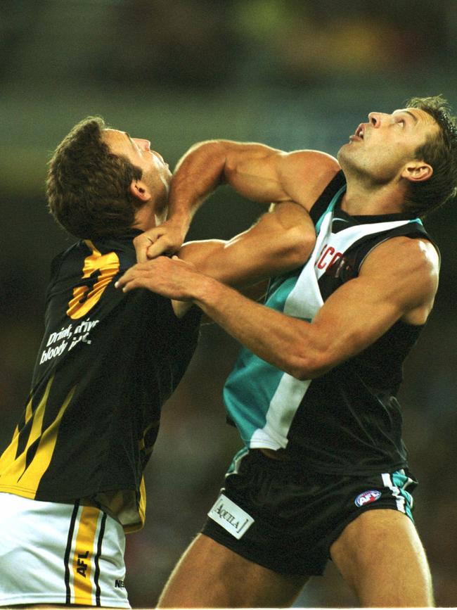 Matthew Primus gets the upper hand over Brad Ottens Richmond v Port Adelaide. Colonial Stadium.