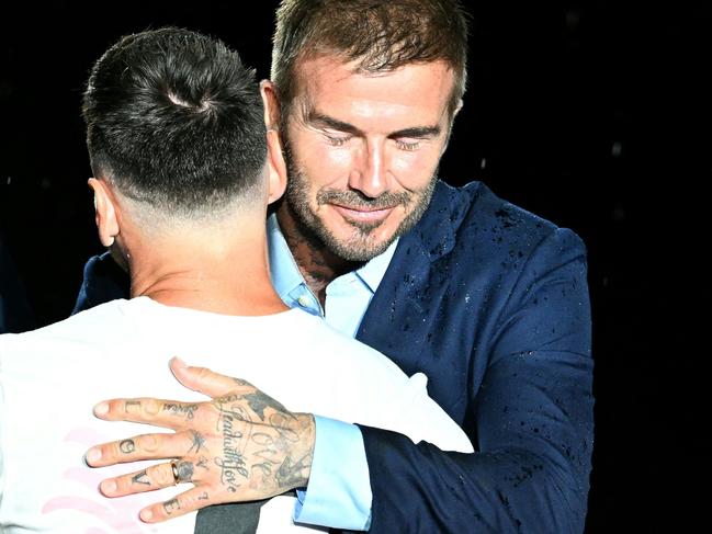 Argentine soccer legend Lionel Messi hugs superstar former player David Beckham, one of the owners of Messi’s new club Inter Miami. Picture: Chandan Khanna/AFP