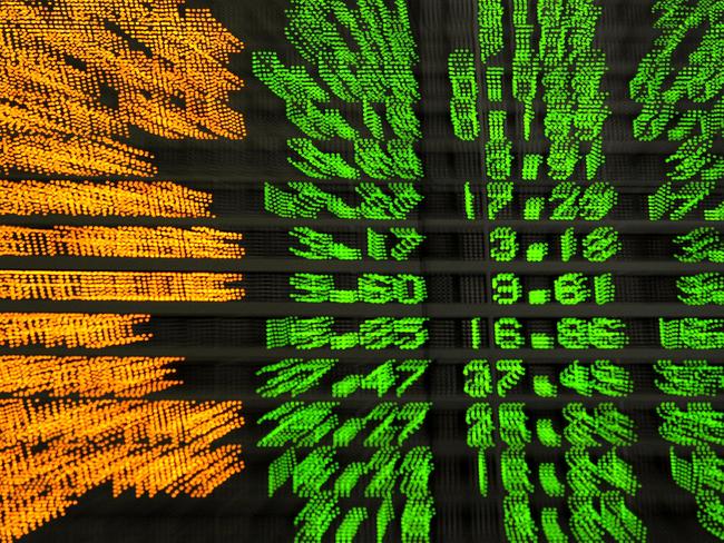 WIRE: This Australian Stock Exchange All Ordinaries board graphic shows company share prices in positive territory indicated by the green numbering, at the opening of trading in Sydney, 11/03/2009.