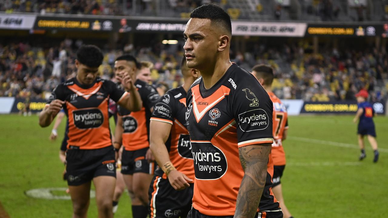 Tigers players process the loss to the Cowboys.