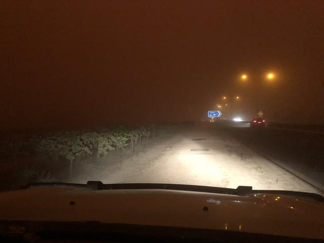 A Twitter picture of a car trying to drive through the storm. Picture: Michael Moodie