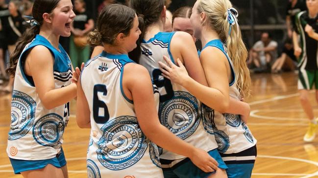 Surfcoast Chargers celebrate their title. Photo: Basketball Victoria.