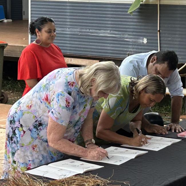 Chief Minister Eva Lawler signing the 10-year Local Decision Making Agreement in Maningrida.