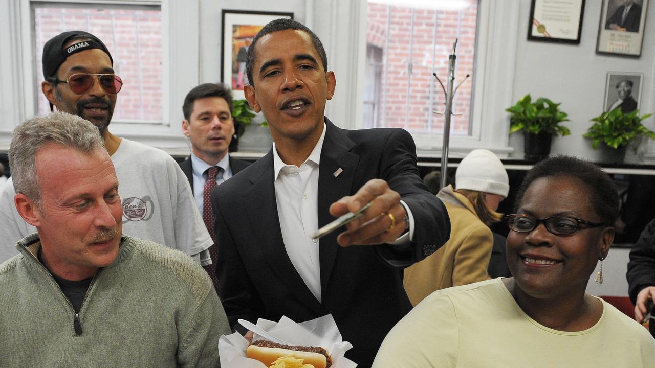 Then US president-elect Barack Obama at Ben's Chili Bowl on January 10, 2009 in Washington, DC. Obama ordered a chili half smoke at the Washington landmark. Picture: AFP/Mandel Ngan