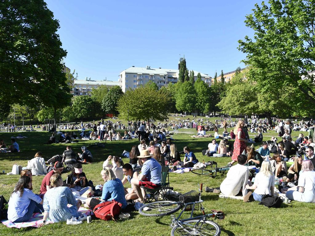 People enjoy the sunny weather in Tantolunden park in Stockholm. Picture: Henrik MONTGOMERY / TT News Agency / AFP