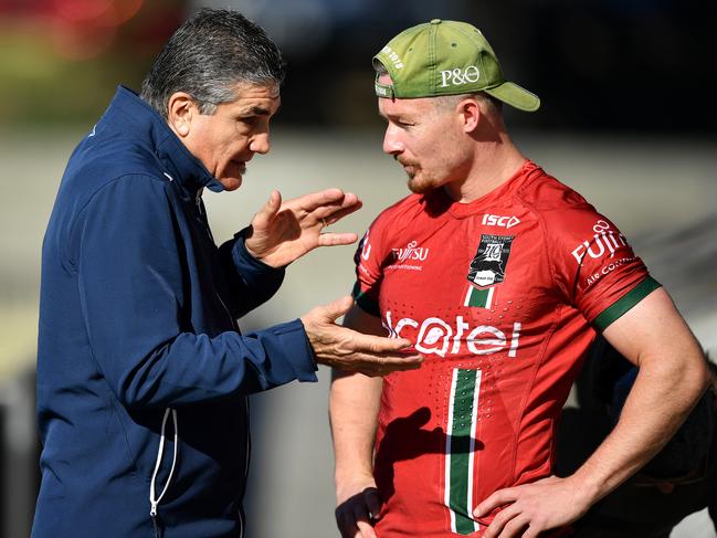 Mario Fenech chats with Damien Cook during training in 2018. Picture: AAP Image/Joel Carrett