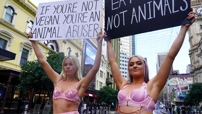 Tash Peterson (right) regularly protests against meat consumption. Picture: NCA NewsWire / Luis Enrique Ascui