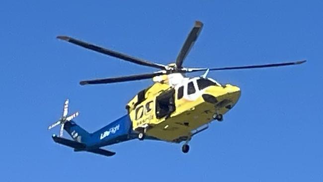 Sunshine Coast-based LifeFlight aeromedical crew winched a paraglider to safety on Sunday afternoon after a mid-air collision. Picture: LifeFlight