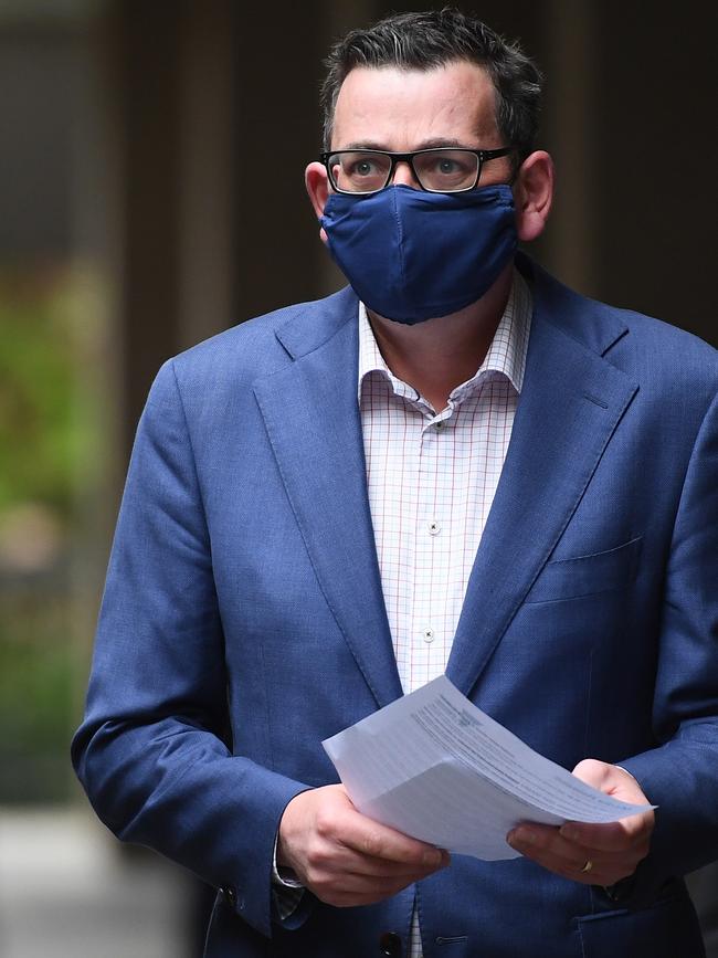 Victorian Premier Daniel Andrews enters a press conference wearing a face mask on July 20, 2020 in Melbourne, Australia. Picture: Getty Images