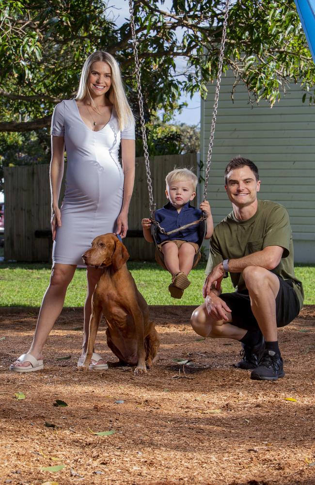 Supercars driver Tim Slade with partner Dani and 2-year-old Jordy and dog Max. Picture: Jerad Williams