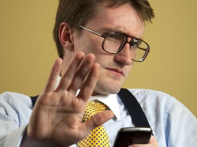 Talk To The Hand Irritated person at work Thinkstock