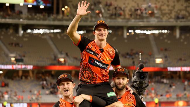 Michael Klinger is chaired of the field by Cameron Bancroft (left) and Andrew Tye. Picture: AAP