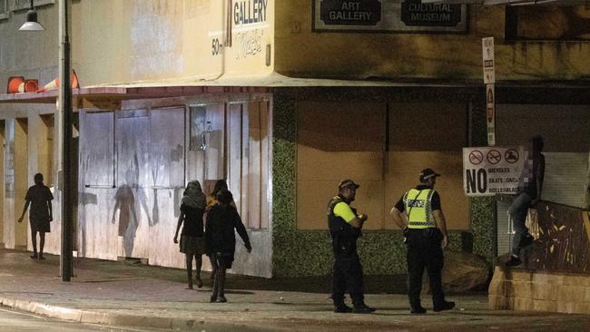 Young Indigenous Australians on the street late at night in Alice Springs. Picture: Liam Mendes / The Australian