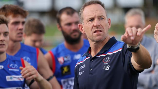 Central District coach Paul Thomas addresses his charges against North Adelaide. Picture: SANFL Image/David Mariuz.