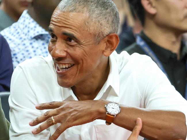 Mr Obama joking with other members of the crowd. Picture: Ethan Miller/Getty Images