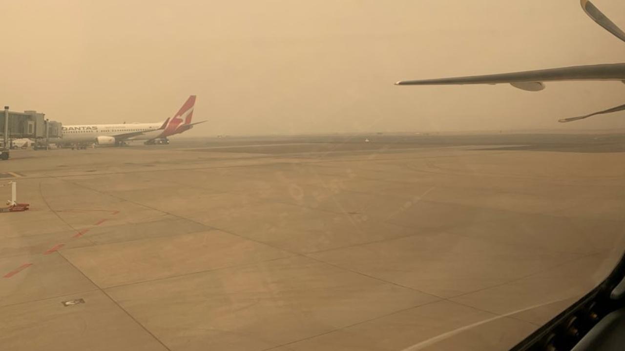 Bushfire smoke seen in Canberra airport. Canberra is shutting down. Posties and airline staff are stopping work and the city is running out of facemasks