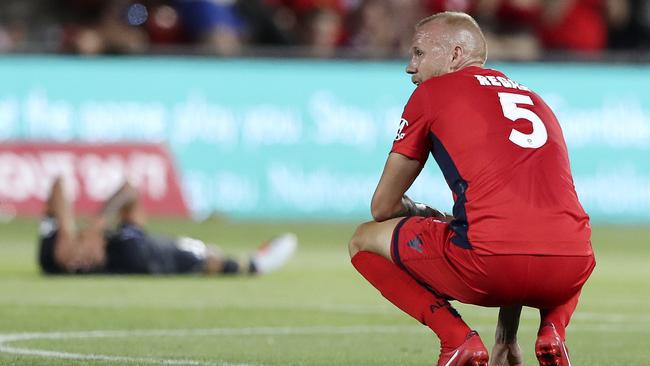  Taylor Regan slumps after the final whistle. Picture SARAH REED