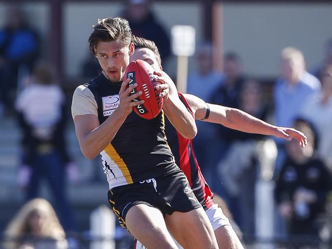 Cameron Manuel takes a mark for Balwyn. Picture: Valeriu Campan