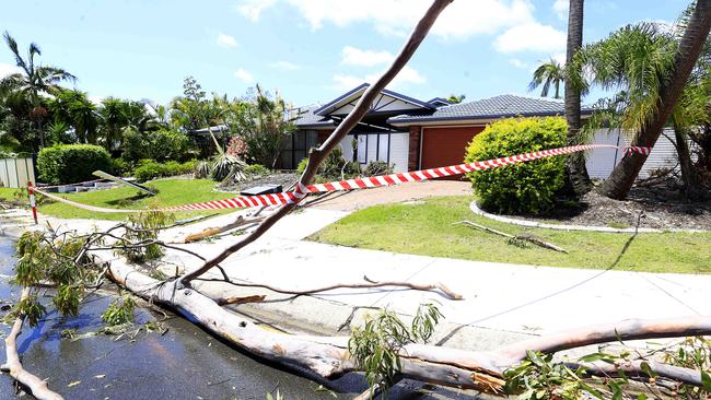 Helensvale was smashed by a ferocious storm in Christmas night leaving a trail of destruction and pictured is the Discovery Drive home where a woman lost her life nearby. Picture: Adam Head