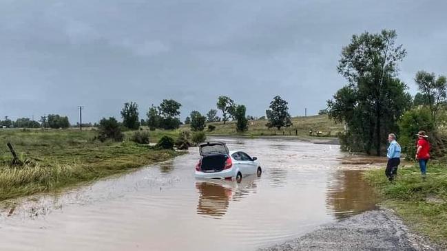 Woolshed creek Rd at Hatton Vale, where a car has become stuck in floodwaters. Picture: Elizabeth Pomery