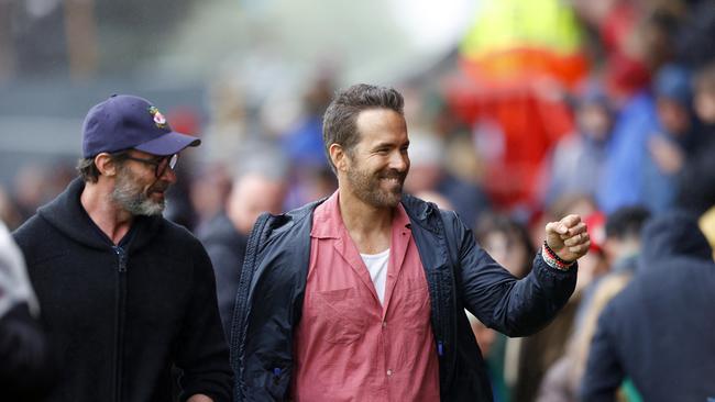 Ryan Reynolds, seen with Hugh Jackman, is a high-profile owner of Wrexham FC. (Photo by Malcolm Couzens/Getty Images)