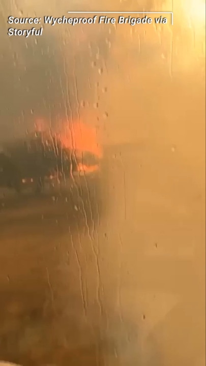 Wild scenes as flames encroach on a fire tanker in Grampians National Park