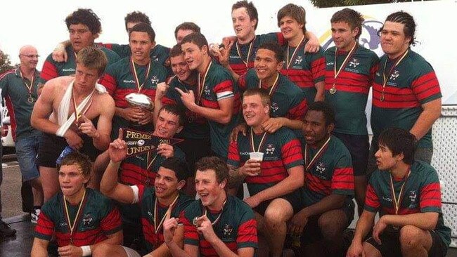 Scott Lynch (third from right in back row) with Southern Suburbs Rugby Club teammates after winning a premiership. Picture: Supplied