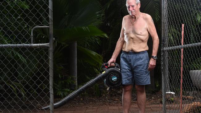 Garry Morris keeps ahead of his lawn mowing duties by removing it. Picture: Helen Orr