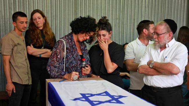 Relatives attend the funeral of Shani Louk, a German-Israeli who was taken hostage on the October 7 by Hamas militants.