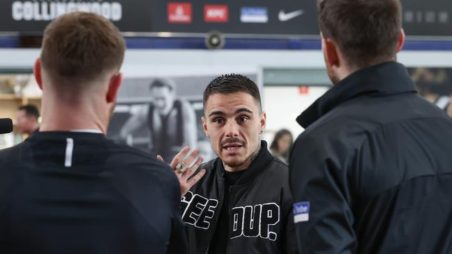 Kambosos chats with the Collingwood players ahead of his huge fight. Picture: David Caird