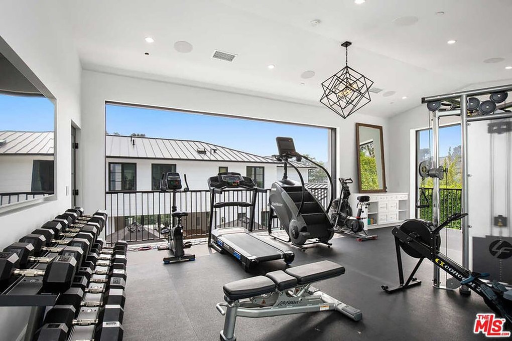 The guesthouse has a huge home gym. Picture: Realtor