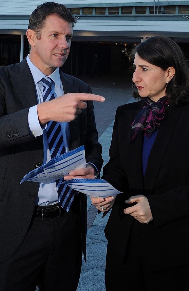 Who will take the crown? Treasurer Mike Baird with Transport Minister Gladys Berejiklian in Mr Baird’s electorate of Manly last year.