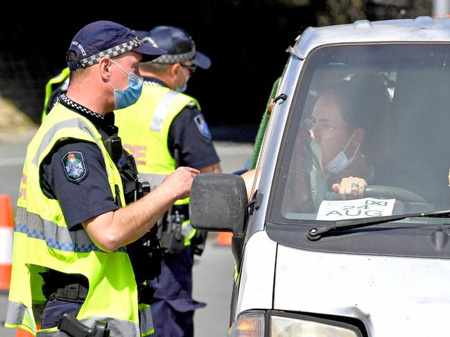 Every single car entering Queensland from NSW is being stopped by police, with only a select few allowed to enter. Picture: NCA NewsWire / John Gass