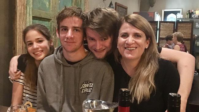 Liam Wolf with his mother Susan Devine and siblings Izaak, 21, and Alanah, 15.