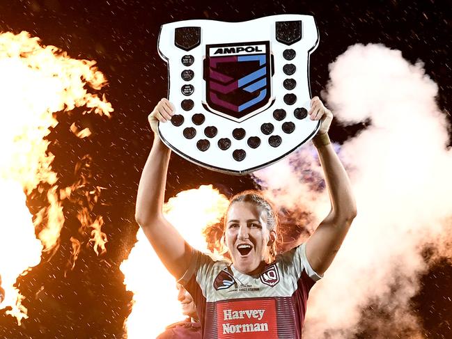 SUNSHINE COAST, AUSTRALIA - JUNE 25: Ali Brigginshaw of Queensland holds up the shield as she celebrates victory after the Women's Rugby League State of Origin match at the Sunshine Coast Stadium on June 25, 2021 in Sunshine Coast, Australia. (Photo by Bradley Kanaris/Getty Images)