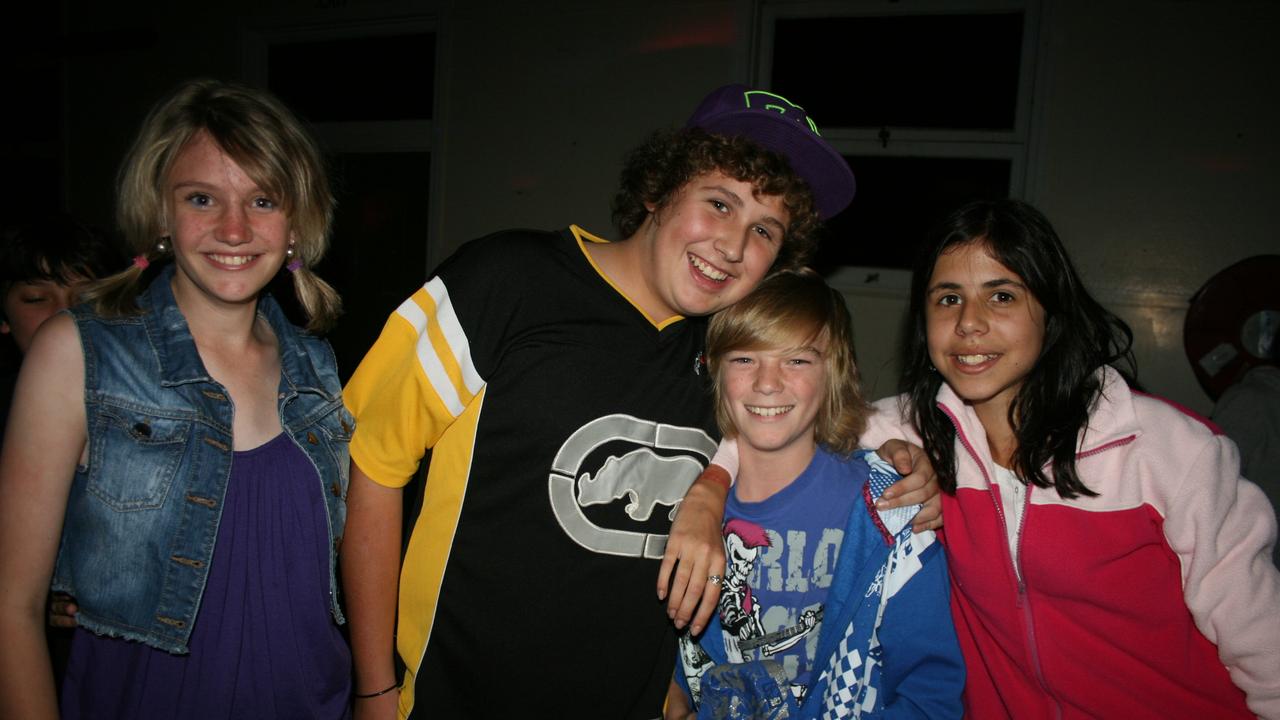 Jasmine Watts, Matt Zimmerle, Jackson Brackin and Allira Charles all smiles at the Blue Light Disco. Photo Deanna Millard / Warwick Daily News