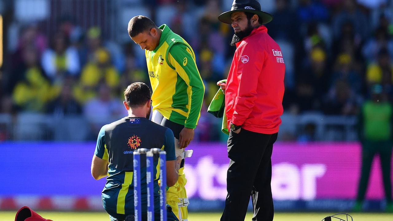 Usman Khawaja receiving treatment on his troublesome hamstring. (Photo by Clive Mason/Getty Images)