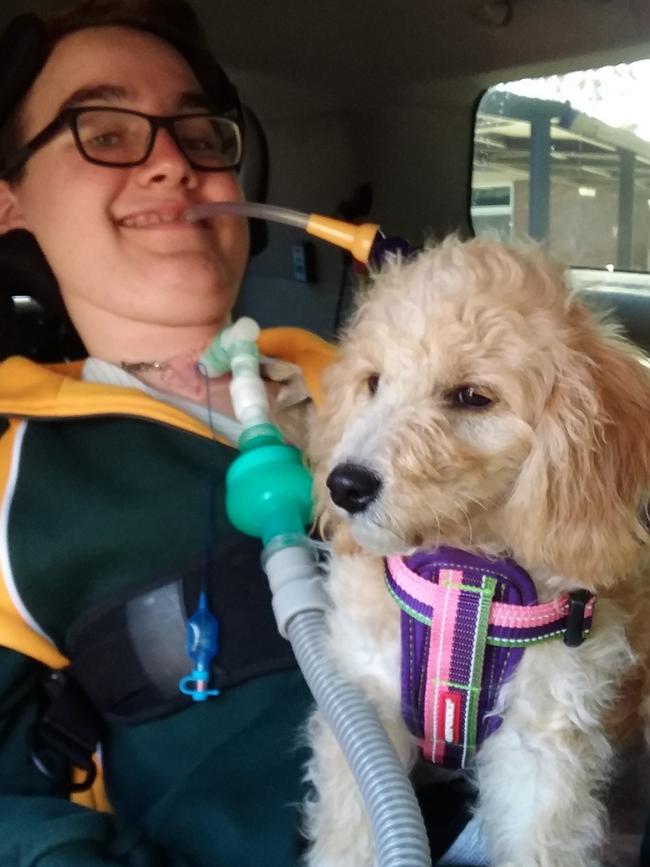 Sam Thorne with his puppy, Maggie. Picture: Supplied