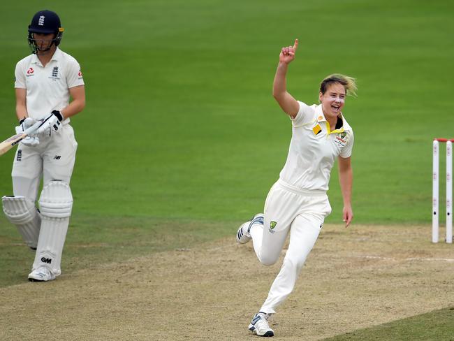 Wicket game ... Ellyse Perry takes England’s Tammy Beaumont.