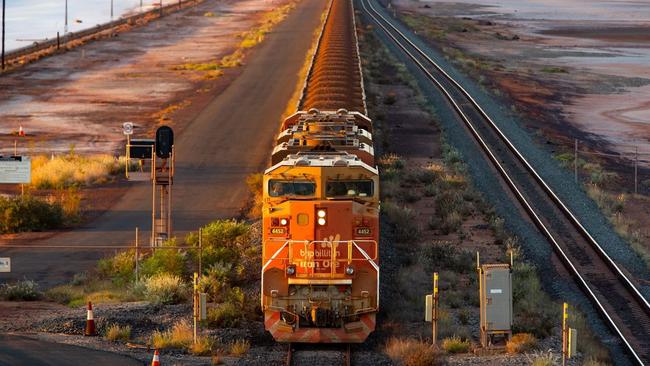 A BHP freight train carrying Australian iron ore to port. Picture: Ian Waldie / Bloomberg.