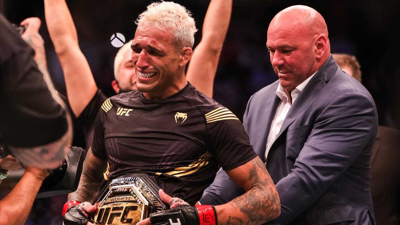 New UFC champion Charles Oliveira was in tears as he received his belt.
