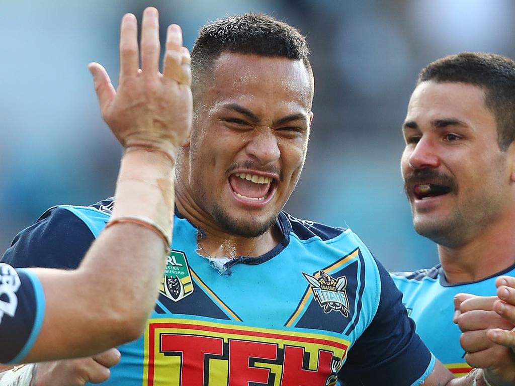 GOLD COAST, AUSTRALIA - JULY 29:  Phillip Sami of the Titans celebrates a try with team mate Ash Taylor during the round 20 NRL match between the Gold Coast Titans and the New Zealand Warriors at Cbus Super Stadium on July 29, 2018 in Gold Coast, Australia.  (Photo by Chris Hyde/Getty Images)