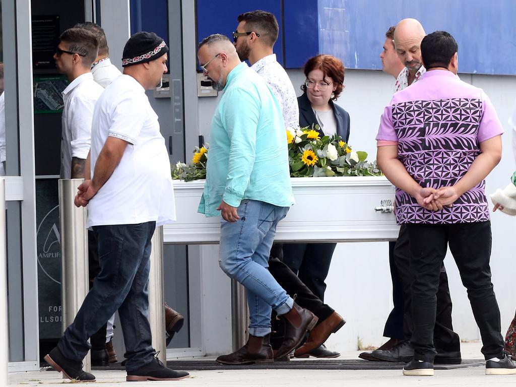 A coffin topped with sunflowers was carried into the venue by loved ones. Picture: NCA NewsWire/ Richard Gosling