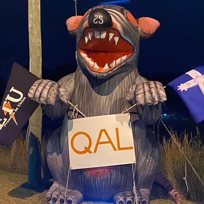 An inflatable rat placed outside QAL on Tuesday morning in protest of fair wages and shift allowances after failed negotiations with workers in recent months. Picture: Supplied (ETU)