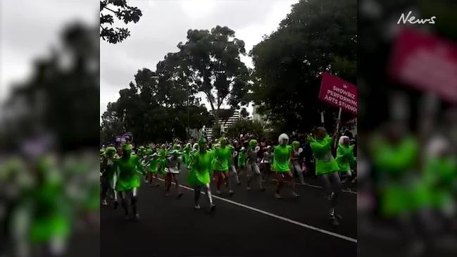 Thousands of people are lining the streets to watch the weird and wacky floats the Moomba parade