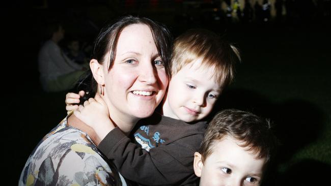 Kate Hannan with Oliver, 2, and Jack, 4, at the New Year’s Eve celebration at North Ipswich Reserve in 2011. Picture: Claudia Baxter