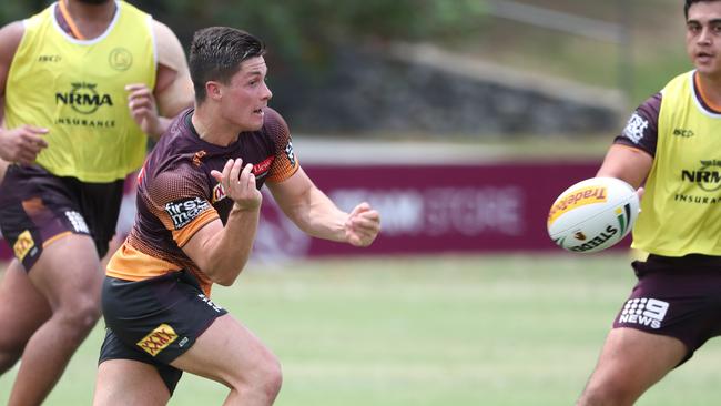 Corey Paix offloads during training last week at Red Hill. Picture: Peter Wallis