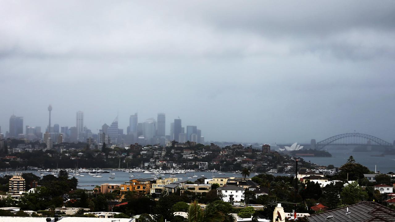 The storm moves in over Sydney from the south on Wednesday. Picture: John Grainger