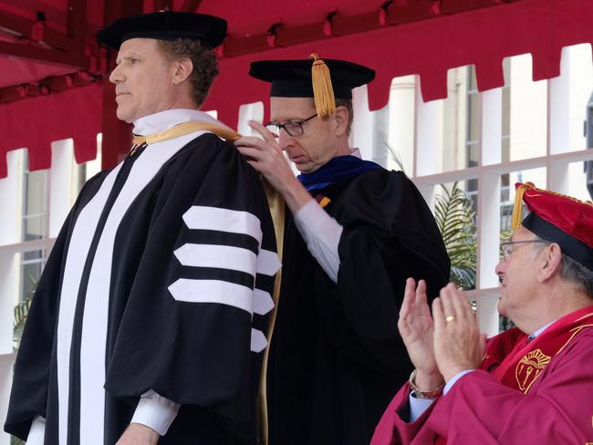 Ferrell proudly receiving his honorary doctorate on May 12. (Photo: Richard Vogel)