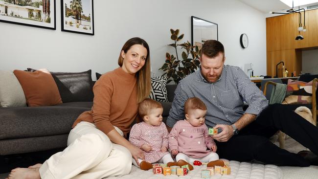 Louise Pilfold and Nick Bent with their 10-month-old identical twins Ella and Ruby. Picture: Richard Dobson